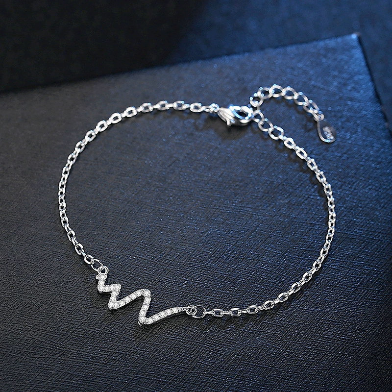 Add a Touch of Edgy Elegance with Our Unique 925 Silver Bracelet Featuring a Stylish Zigzag Design and Sparkling Crystals, Perfect for Making a Bold Statement in Any Outfit